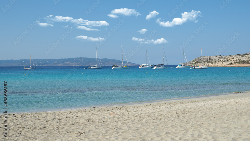 Beautiful sandy beach of Simos with crystal clear turquoise sea and natural sand dunes, Elafonisos island, Peloponnese, Greece Beautiful sandy beach of Simos with crystal clear turquoise sea and natural sand dunes, Elafonisos island, Peloponnese, Greece