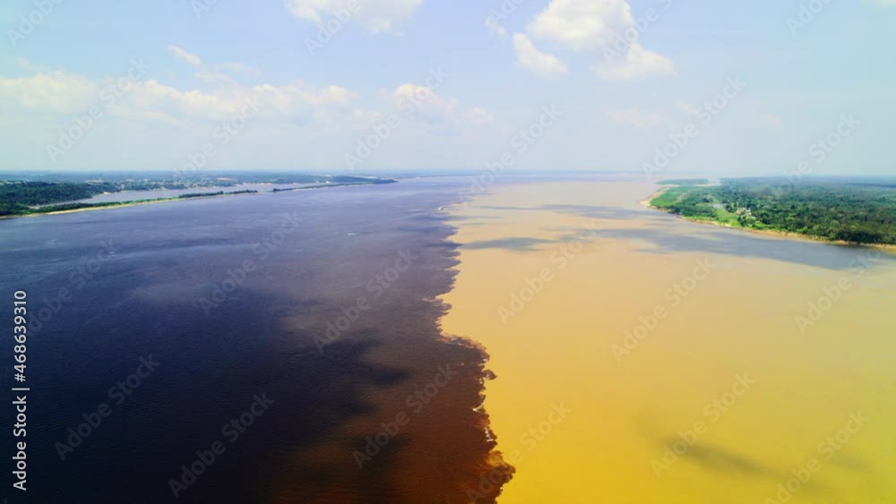 The confluence of two rivers in the Amazon. Manaus, Rio Negro. The confluence of two rivers in the Amazon. Manaus, Rio Negro.