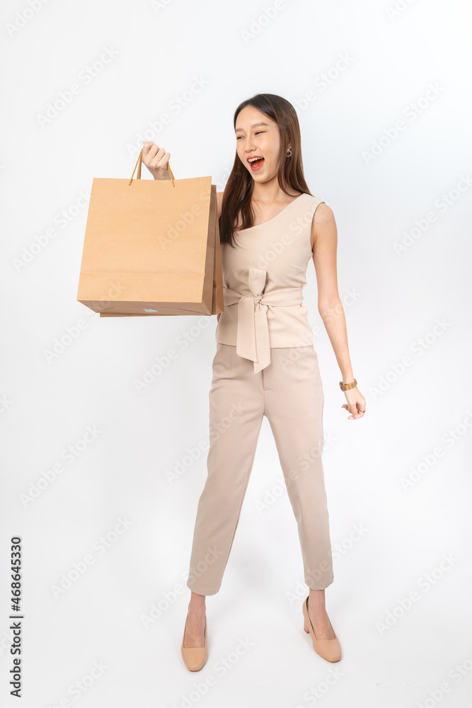 A series of photo collection focusing on the moments, expression and gestures of an asian office lady with brown shopping bag that also look like delivery bag. All are full body, high resolution shots A series of photo collection focusing on the moments, expression and gestures of an asian office lady with brown shopping bag that also look like delivery bag. All are full body, high resolution shots