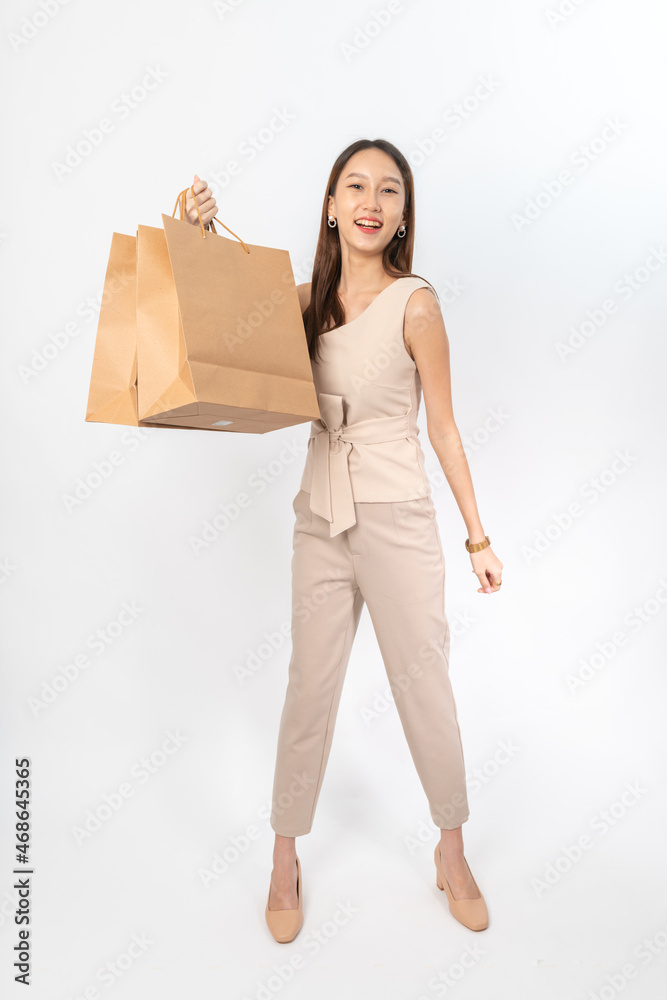 A series of photo collection focusing on the moments, expression and gestures of an asian office lady with brown shopping bag that also look like delivery bag. All are full body, high resolution shots A series of photo collection focusing on the moments, expression and gestures of an asian office lady with brown shopping bag that also look like delivery bag. All are full body, high resolution shots