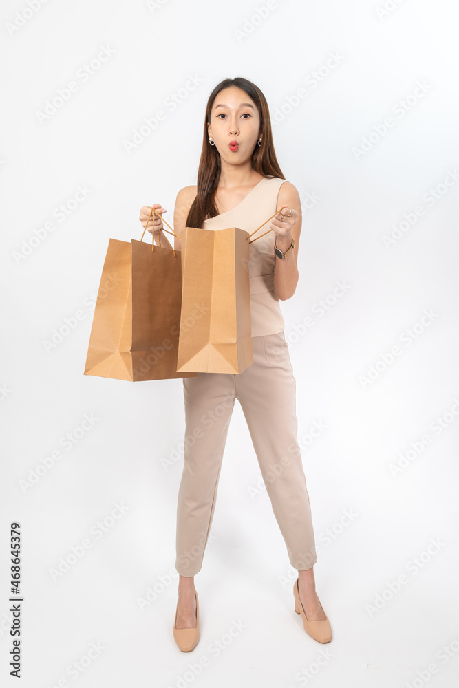 A series of photo collection focusing on the moments, expression and gestures of an asian office lady with brown shopping bag that also look like delivery bag. All are full body, high resolution shots