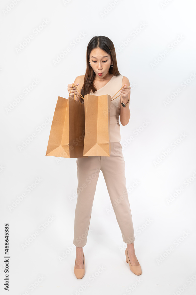 A series of photo collection focusing on the moments, expression and gestures of an asian office lady with brown shopping bag that also look like delivery bag. All are full body, high resolution shots