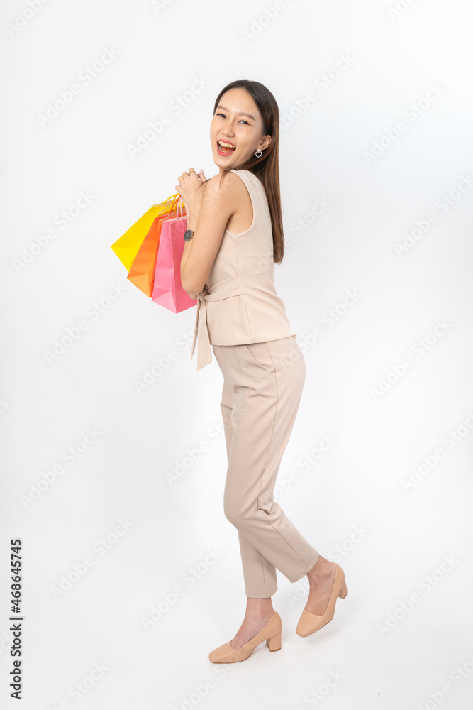 Photograph of a collective series of young asian lady with colorful shopping bags with different expression, moods and gesture. Very suitable for all kind of media application and usage. Photograph of a collective series of young asian lady with colorful shopping bags with different expression, moods and gesture. Very suitable for all kind of media application and usage.