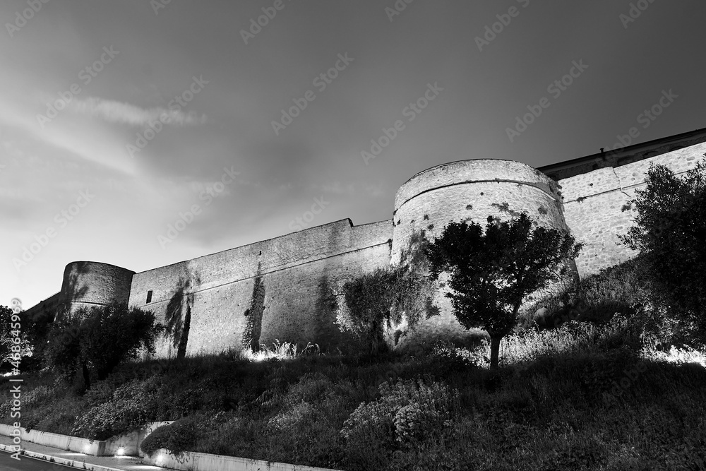 Fototapeta premium Medieval stone fortified towers at night in Magliano in Tuscany