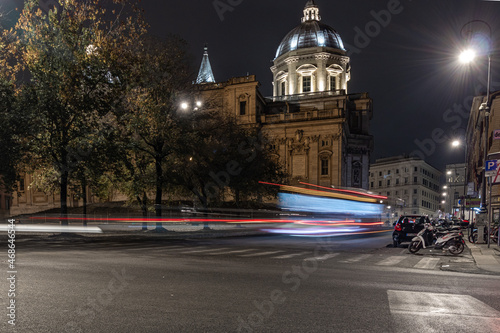 traffic in the city at night. Cool long exposure cars traffic light trails, night view of the city of Rome © Bar