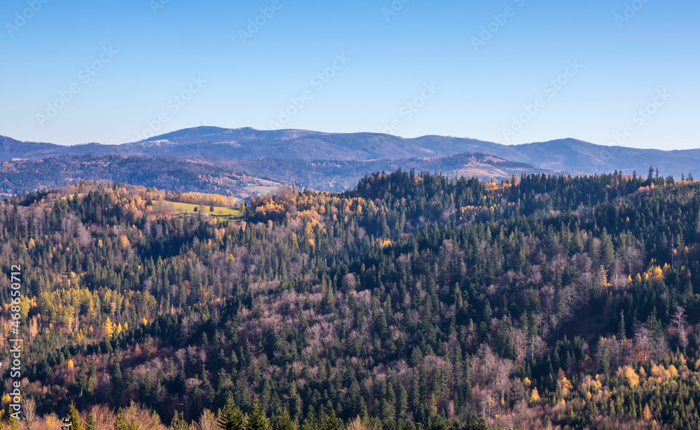 View on autumn forests and mountain landscape seen from the top of Soszów peak in Wisła