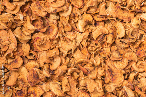 Sun-Dried Apple Slices. Finely Sliced Apples as Background