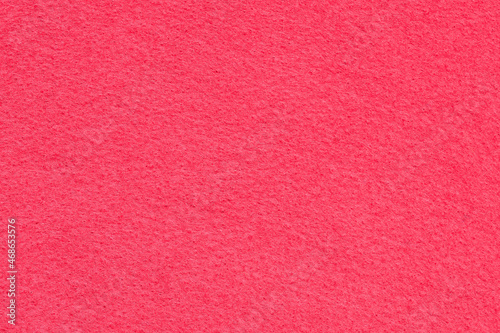 The background of dark pink felt textile