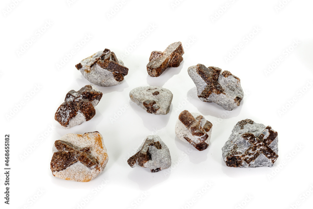 macro mineral stone Staurolite on a white background macro mineral stone Staurolite on a white background