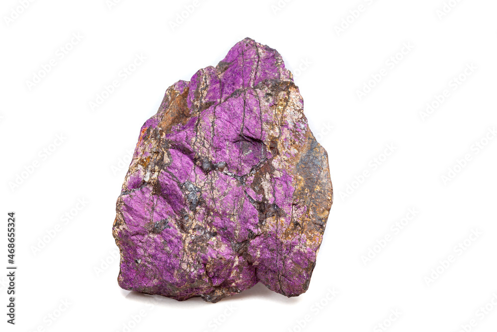 Macro mineral stone purpureus, (purple) purpurite in the breed a white background Macro mineral stone purpureus, (purple) purpurite in the breed a white background