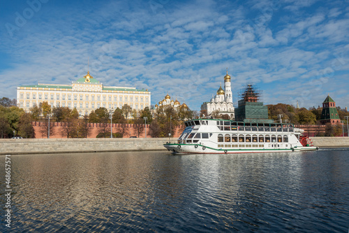 The passenger ship is sailing along the Moskva River,