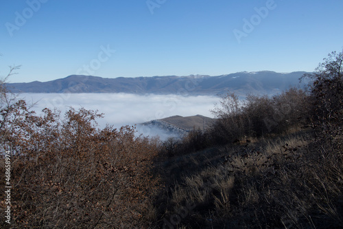 Fog and  clouds over high mountain
