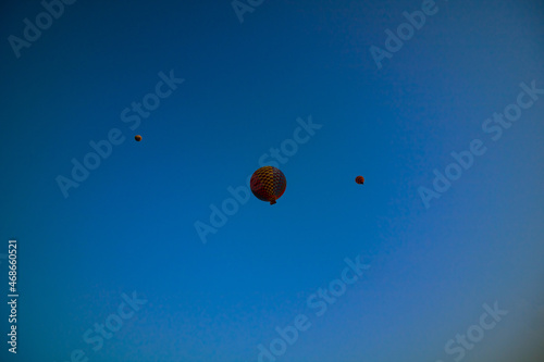 Hot air balloon tour. Hot air balloon tour from below at sunrise in Cappadocia