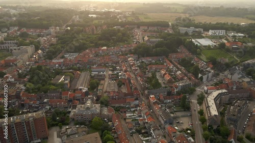 Flying over Leuven Belgium toward open fields photo