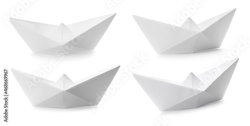 Photos Set with paper boats on white background