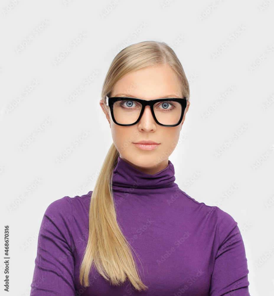 young girl wearing black glasses