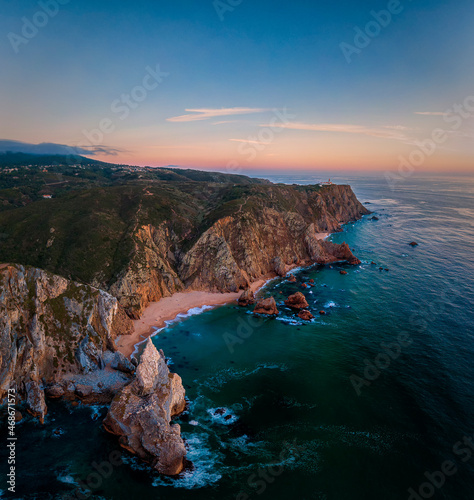 Aerial picture of the Cabo da Roca coastline during sunset, with beaches, rocks and coastline of Portugal