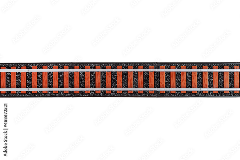 Railway tracks for a toy railway, railway crossing, isolated on a white background, for children Railway tracks for a toy railway, railway crossing, isolated on a white background, for children