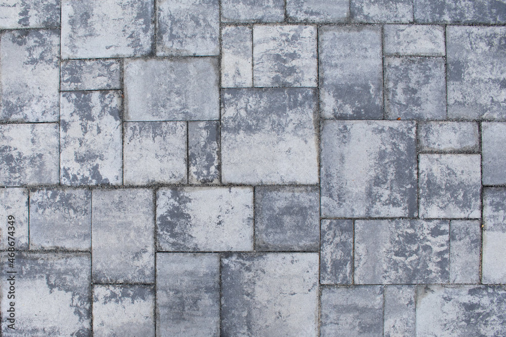 Obraz premium Grey and white pavement stone background