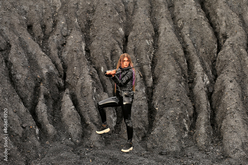 Woman with katana sword near coal © Сергей Луговский