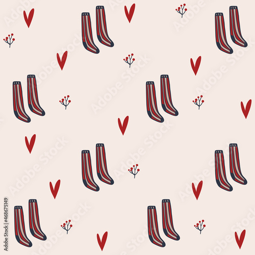 Seamless pattern with hand drawn red socks and hearts. .Cute christmas pattern. photo