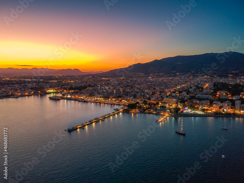 Aerial seaside view over seaside city of Kalamata, Greece at sunset