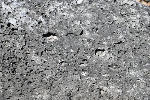 Texture of volcanic rock with holes, Kaena Point, Oahu, Hawaii photo