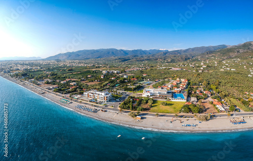 Aerial seaside view over seaside city of Kalamata, Greece at sunset photo