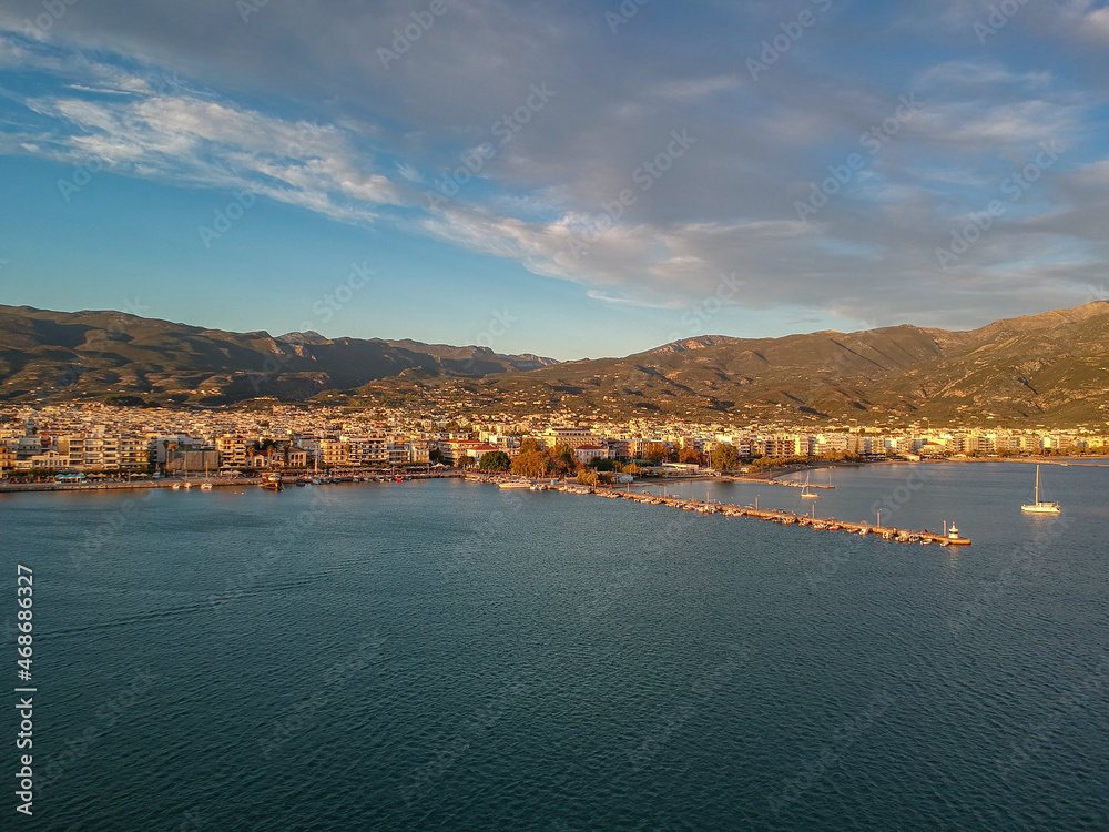 Aerial seaside view over seaside city of Kalamata, Greece at sunset