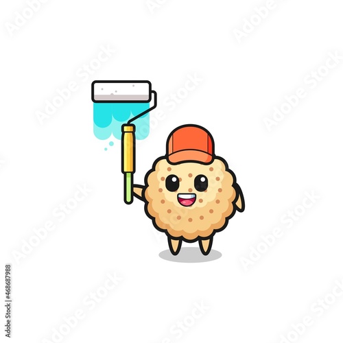 the round biscuits painter mascot with a paint roller
