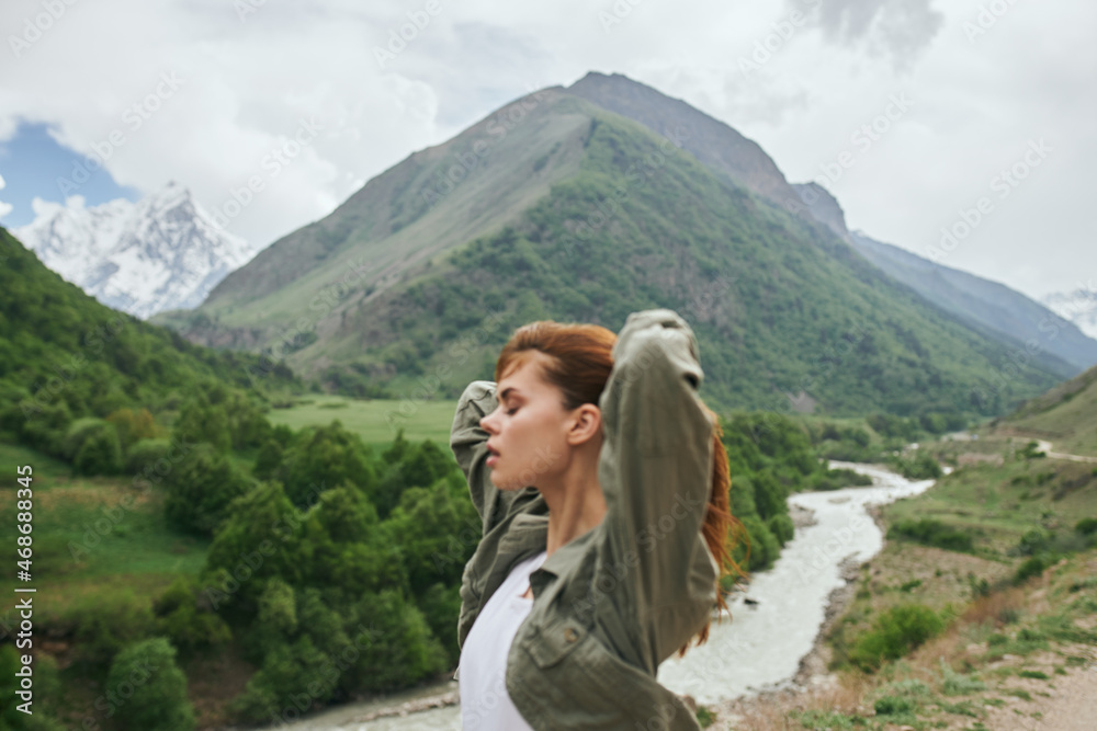 woman hiker mountains landscape travel fresh air