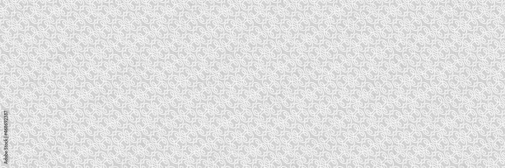 Light background image with abstract white ornament on gray background for your design. Seamless background for wallpaper, textures.