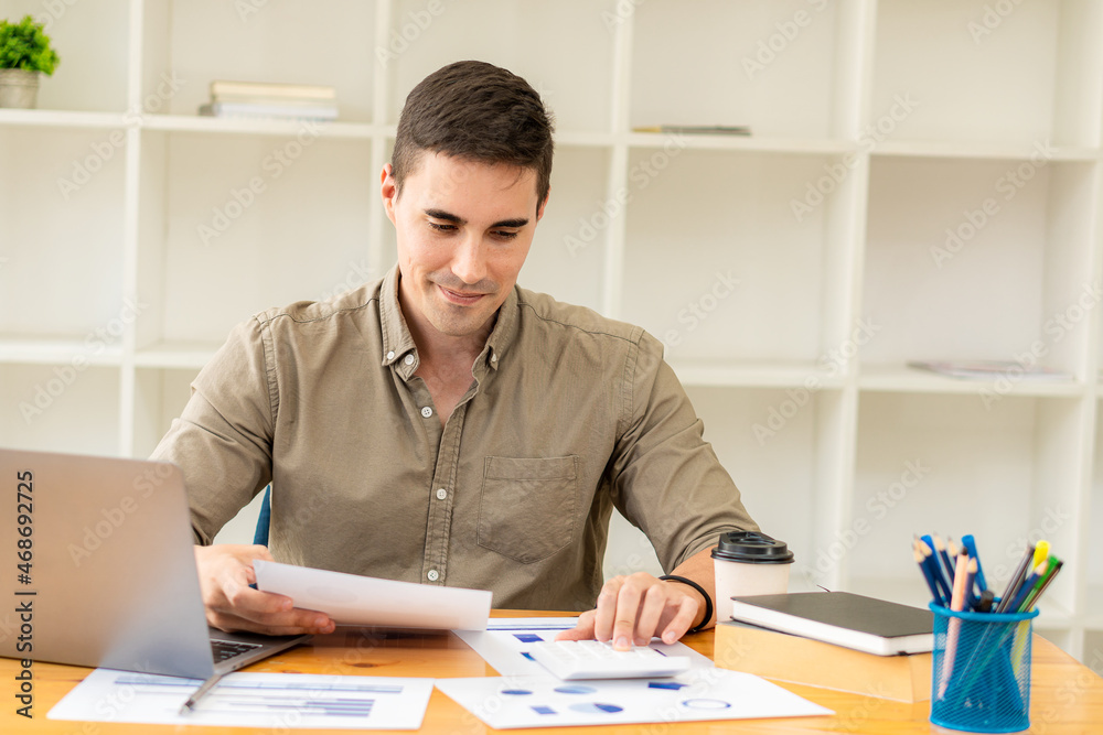 businessman working on laptop computer with business data diagram Accountants are working and analyzing financial reports. Project accounting with graphs, charts and concept calculators. businessman working on laptop computer with business data diagram Accountants are working and analyzing financial reports. Project accounting with graphs, charts and concept calculators.
