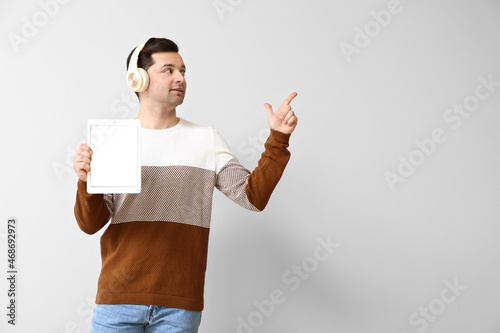 Young man with tablet compu...