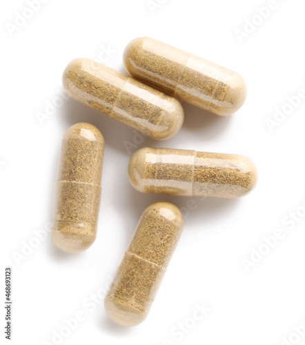 Vitamin K capsules isolated on white background photo