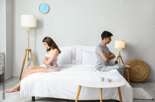 Upset young woman after qua...