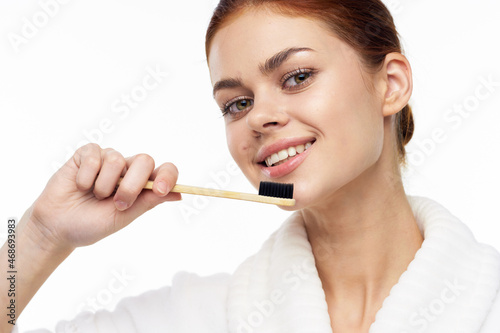cheerful woman in white coat toothbrush dental health hygiene