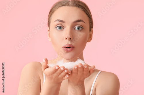 Beautiful young woman with ...