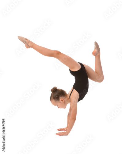 Little girl doing gymnastic...