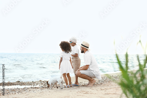 Little children with father...