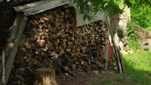 Wallpaper Mural A large stack of snow-covered firewood stands on backyard in the village. Torontodigital.ca