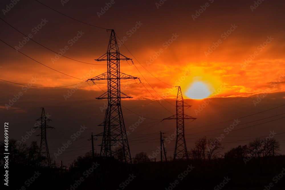 High voltage power line at sunset