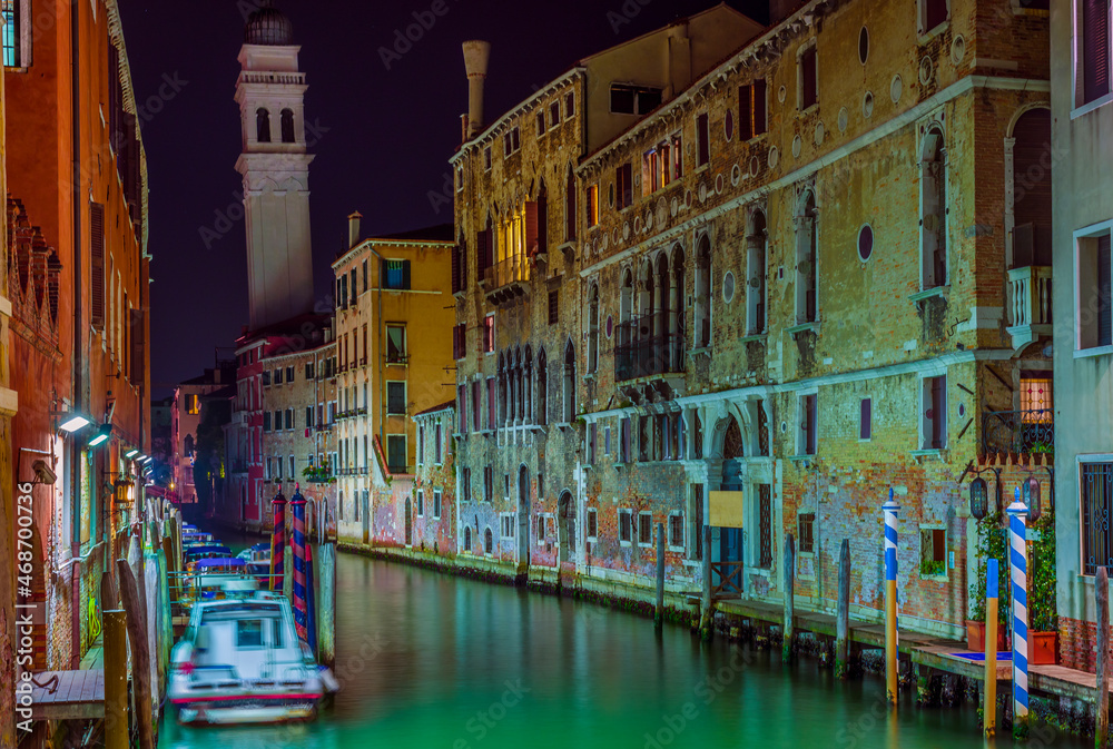 Venetian buildings and channels at night, Venice, Italy