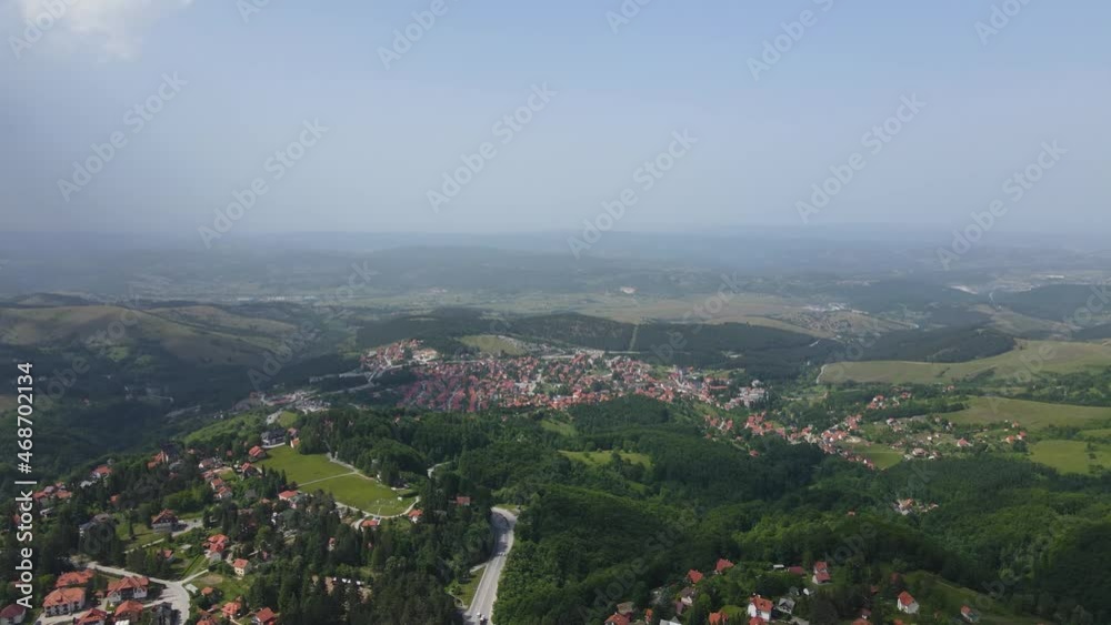 Zlatibor Mountain and Cajetina Municipality, High Rise Aerial View of Landscape and Hillside Houses, Cinematic Drone Shot Zlatibor Mountain and Cajetina Municipality, High Rise Aerial View of Landscape and Hillside Houses, Cinematic Drone Shot