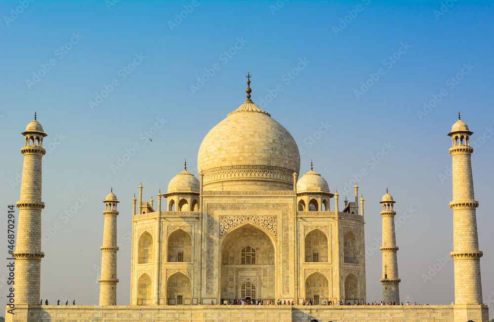 The Taj Mahal is an ivory-white marble mausoleum on the bank of the Yamuna river in the city of Agra, Uttar Pradesh.
