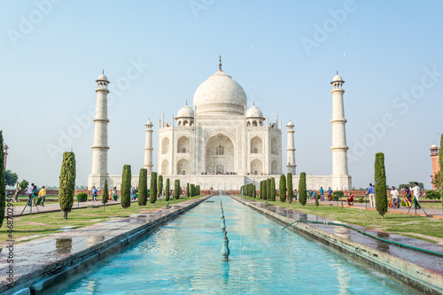 The Taj Mahal is an ivory-white marble mausoleum on the bank of the Yamuna river in the city of Agra, Uttar Pradesh. 