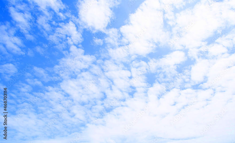 Many fluffy white clouds in the clear sky, beautiful sky background. Many fluffy white clouds in the clear sky, beautiful sky background.