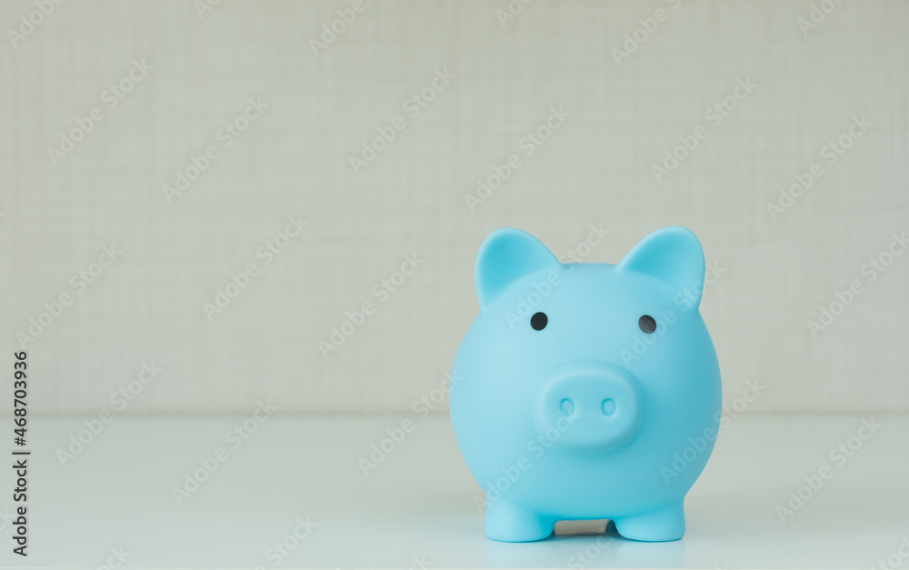 Saving money concept,piggy bank on table,selective focus. Saving money concept,piggy bank on table,selective focus.