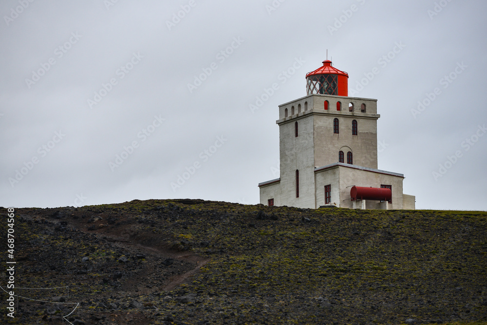 Typically overcast sky above Dyrhólaey Lighthouse, which marks the southernmost point of mainland Iceland