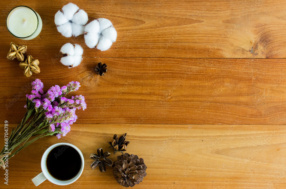 Nature flowers with coffee and nuts over the wooden table with nature light. Nature flowers with coffee and nuts over the wooden table with nature light.